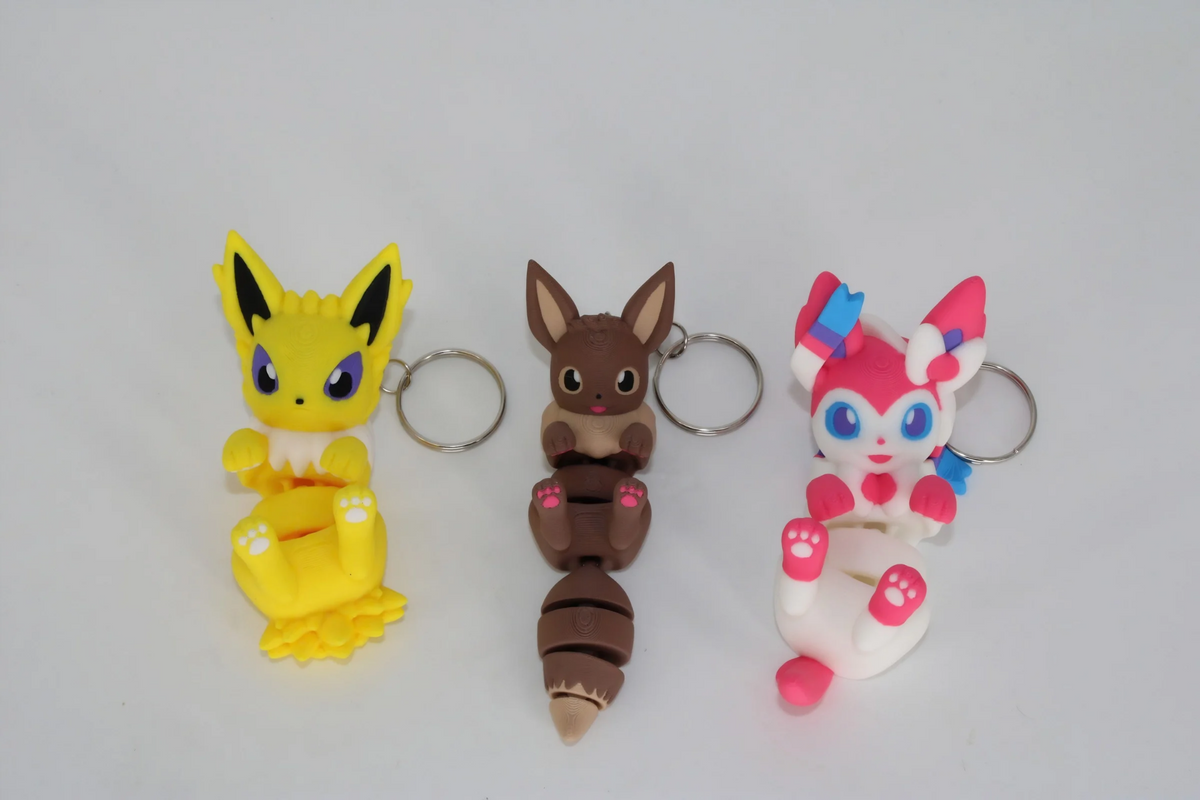 Articulated Flexi Eevee Eeveelution Keychain 3 Piece Set. Included Eevee, Sylveon, and Jolteon!